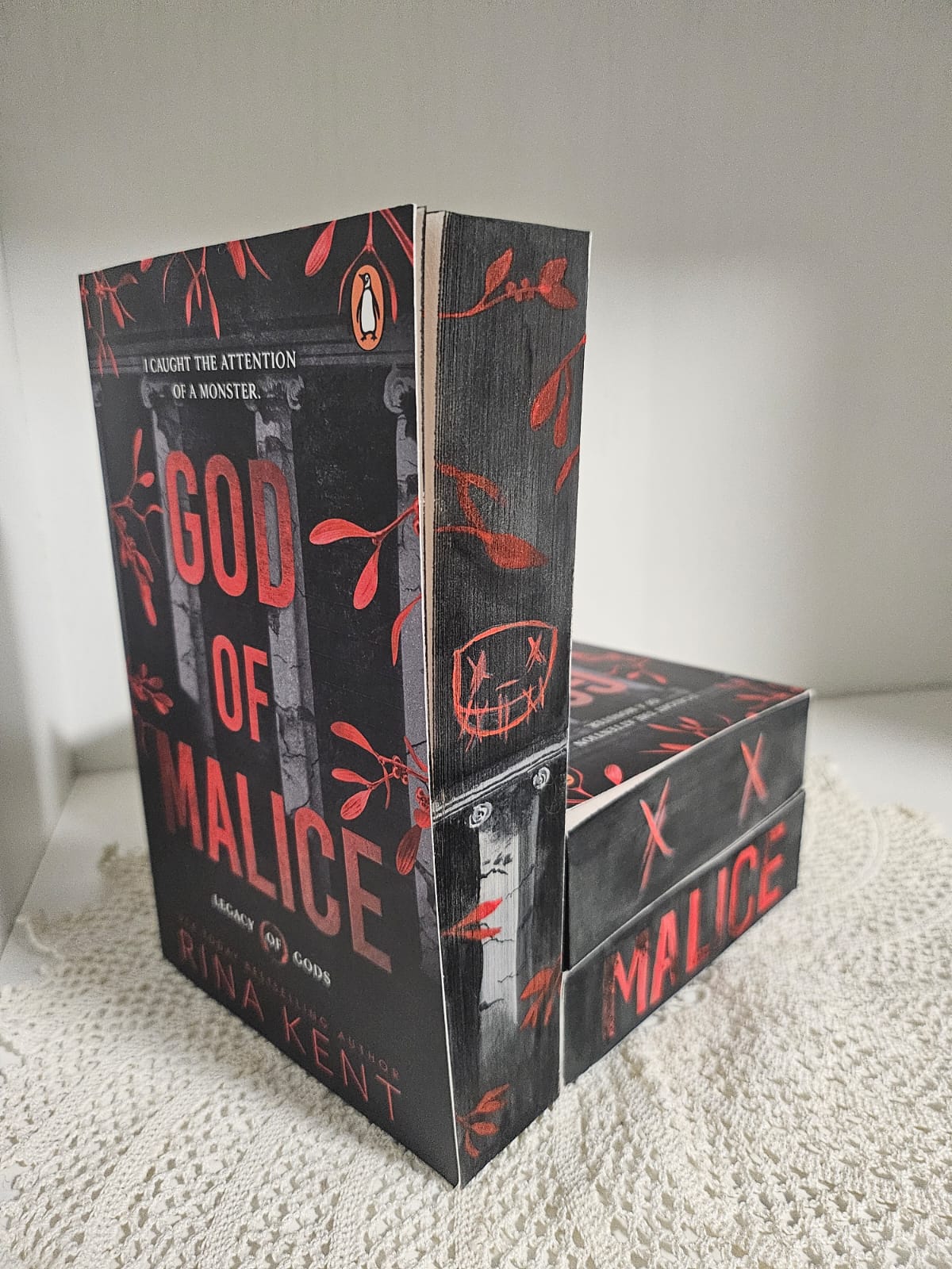 Close-up of sprayed/painted edges on God of Malice deluxe